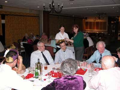 Members and guests and staff during the meal